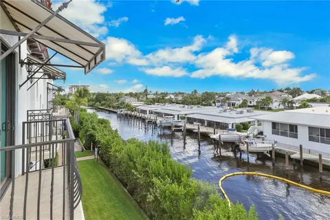 a view of a lake with a building in front of it