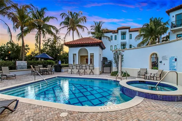 a view of a lake with building in the background