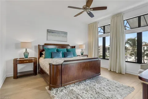 a living room with furniture and windows