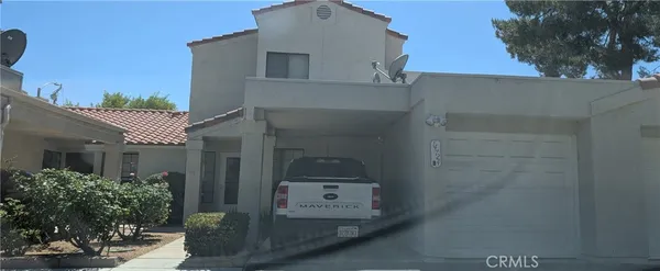 a view of a car garage of a house
