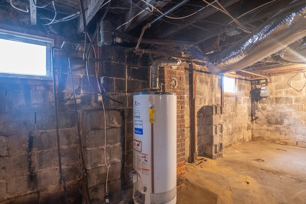 62 Kenyon Street Springfield, MA 01109 - Photo 17 of 19 a view of a bathroom with a shower and a sink