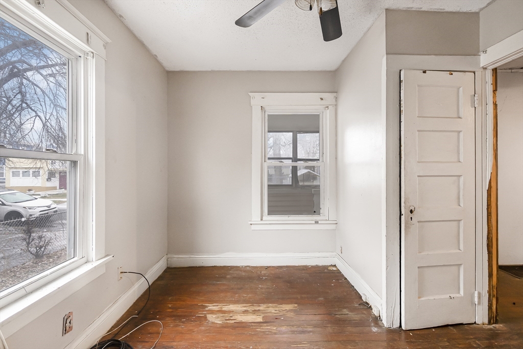 62 Kenyon Street Springfield, MA 01109 - Photo 10 of 19 an empty room with windows