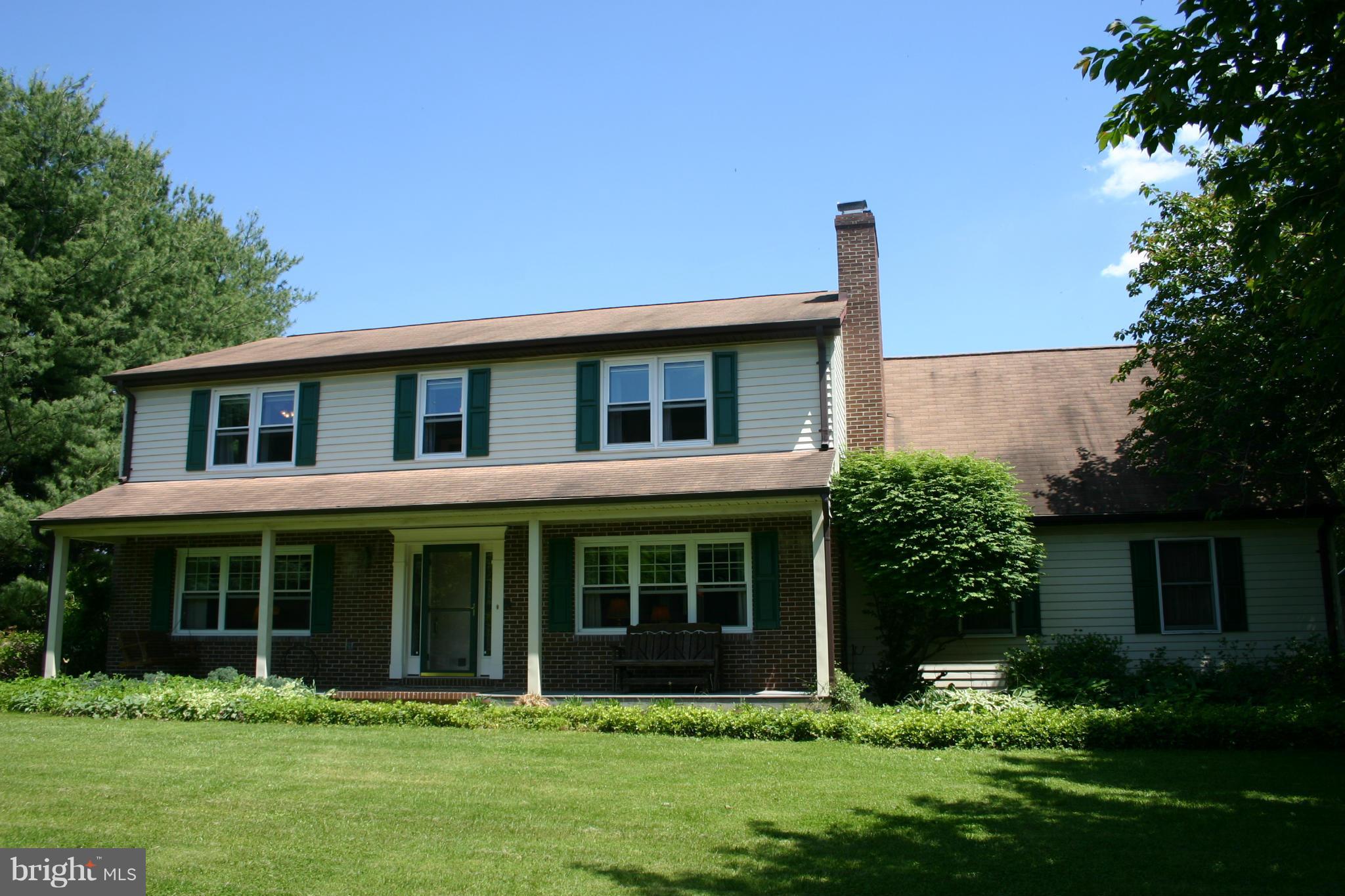 14003 Glen High Road Baldwin, MD 21013 - Photo 1 of 26 a front view of a house with a yard
