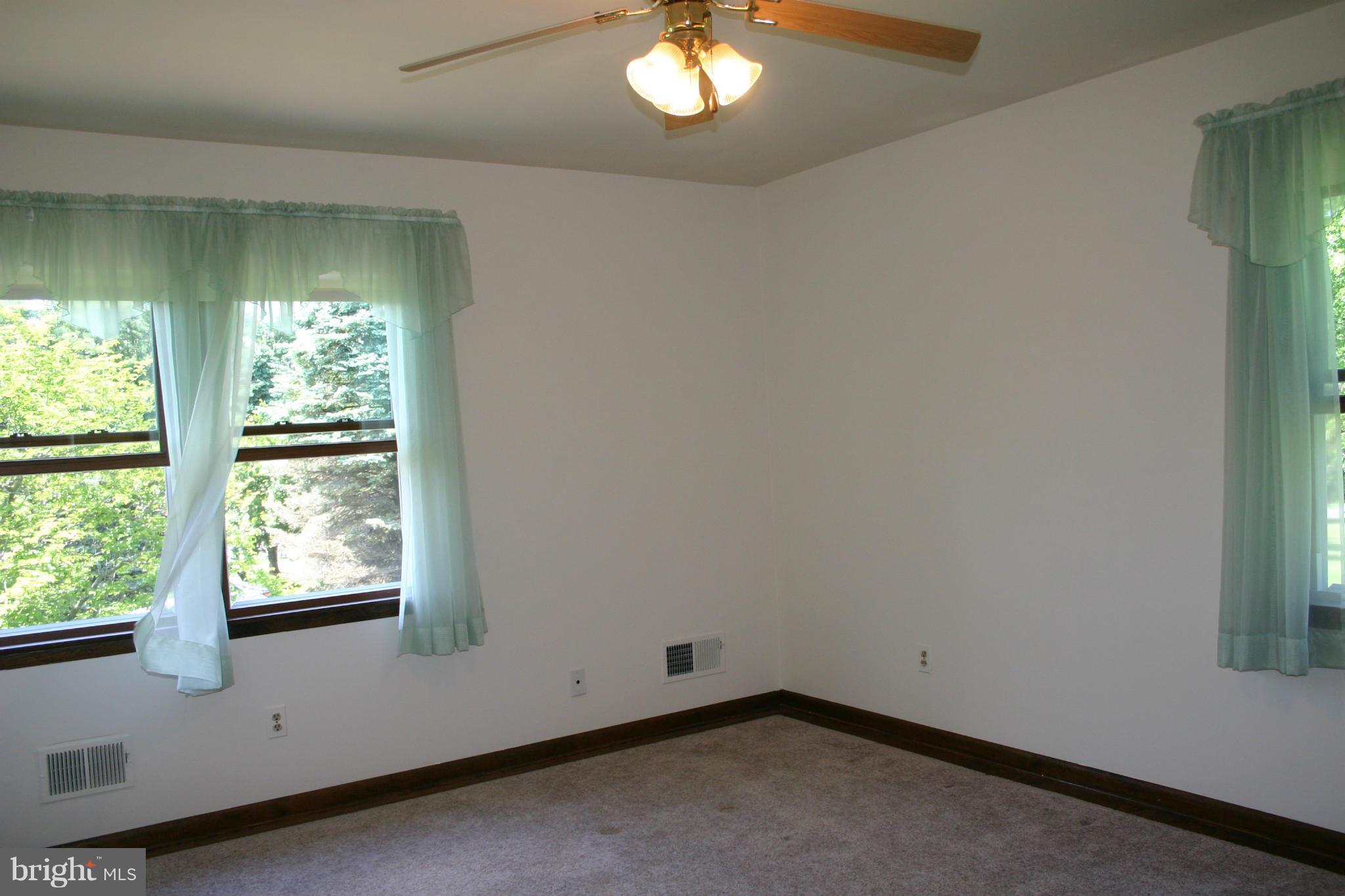 14003 Glen High Road Baldwin, MD 21013 - Photo 12 of 26 an empty room with a window
