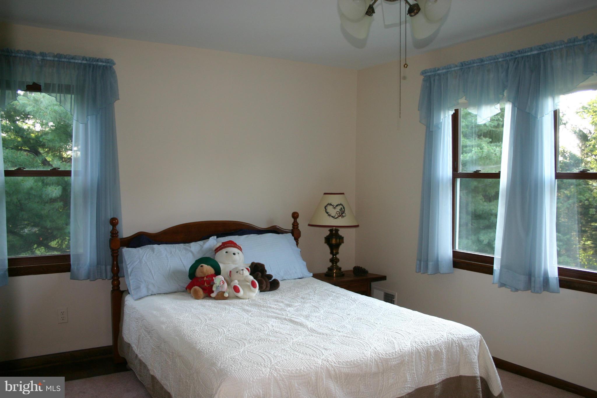 14003 Glen High Road Baldwin, MD 21013 - Photo 13 of 26 a bedroom with a bed and a window
