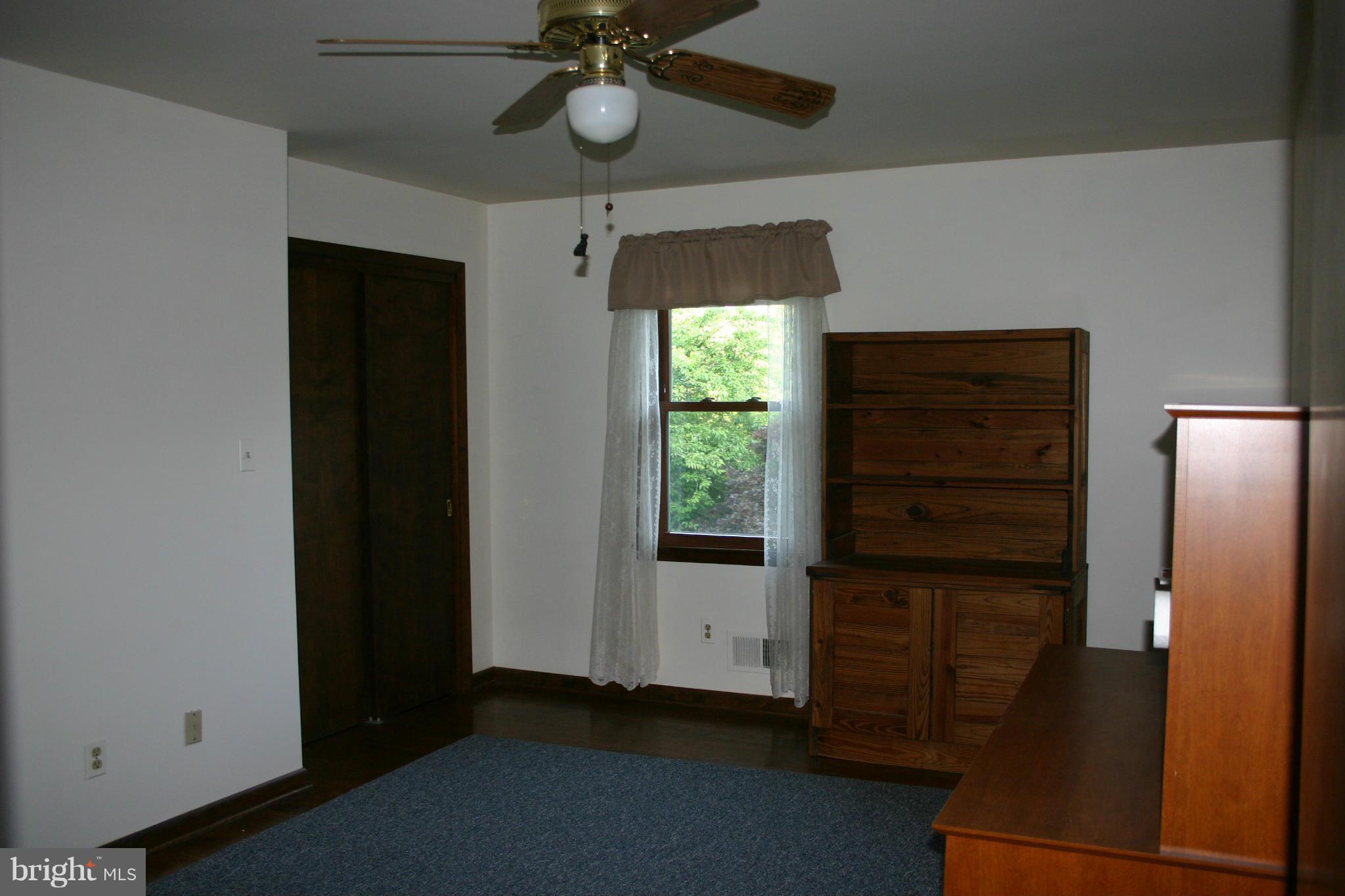 14003 Glen High Road Baldwin, MD 21013 - Photo 14 of 26 wooden floor in an empty room