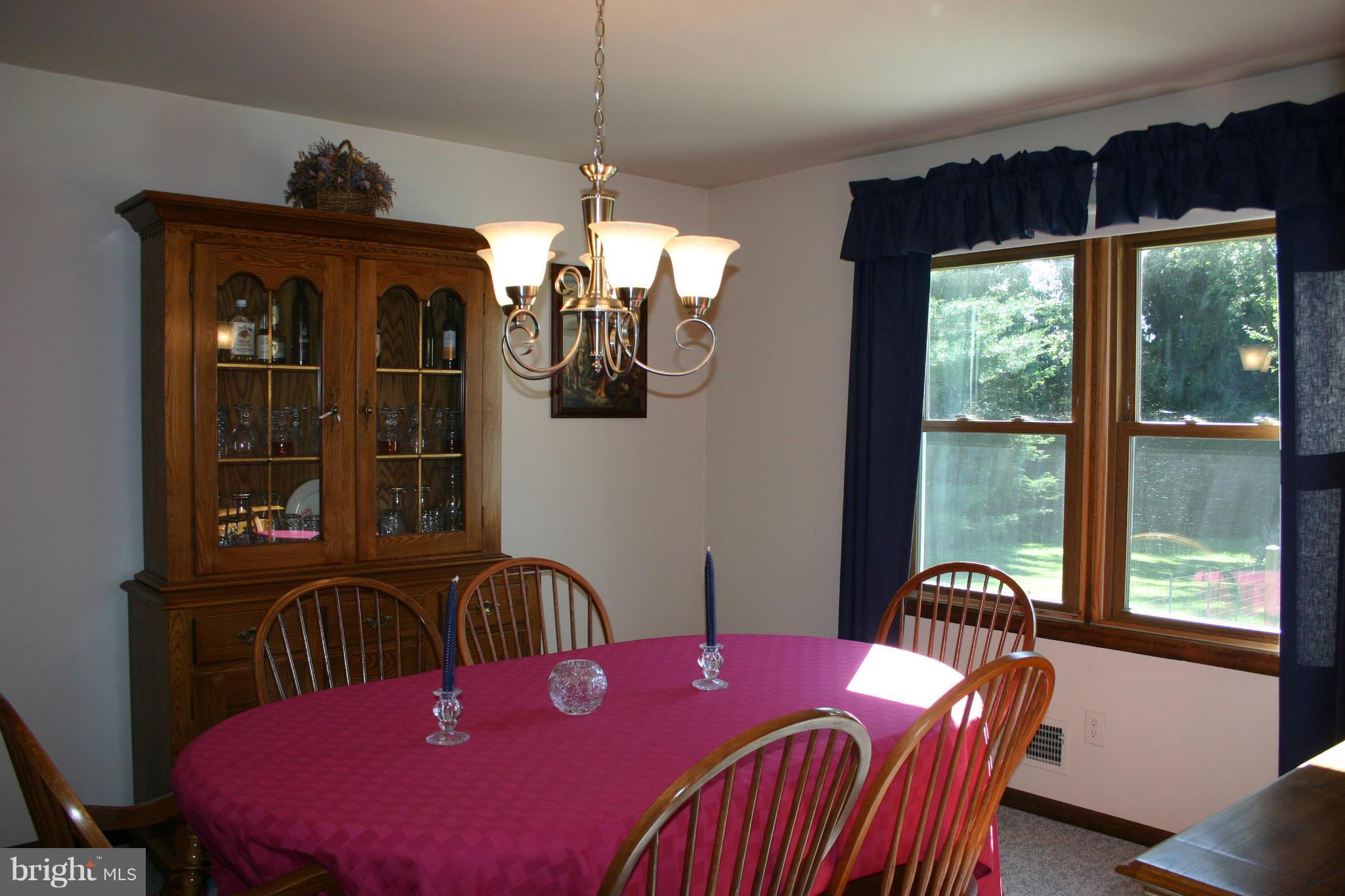 14003 Glen High Road Baldwin, MD 21013 - Photo 4 of 26 a view of a dining room with furniture window and outside view