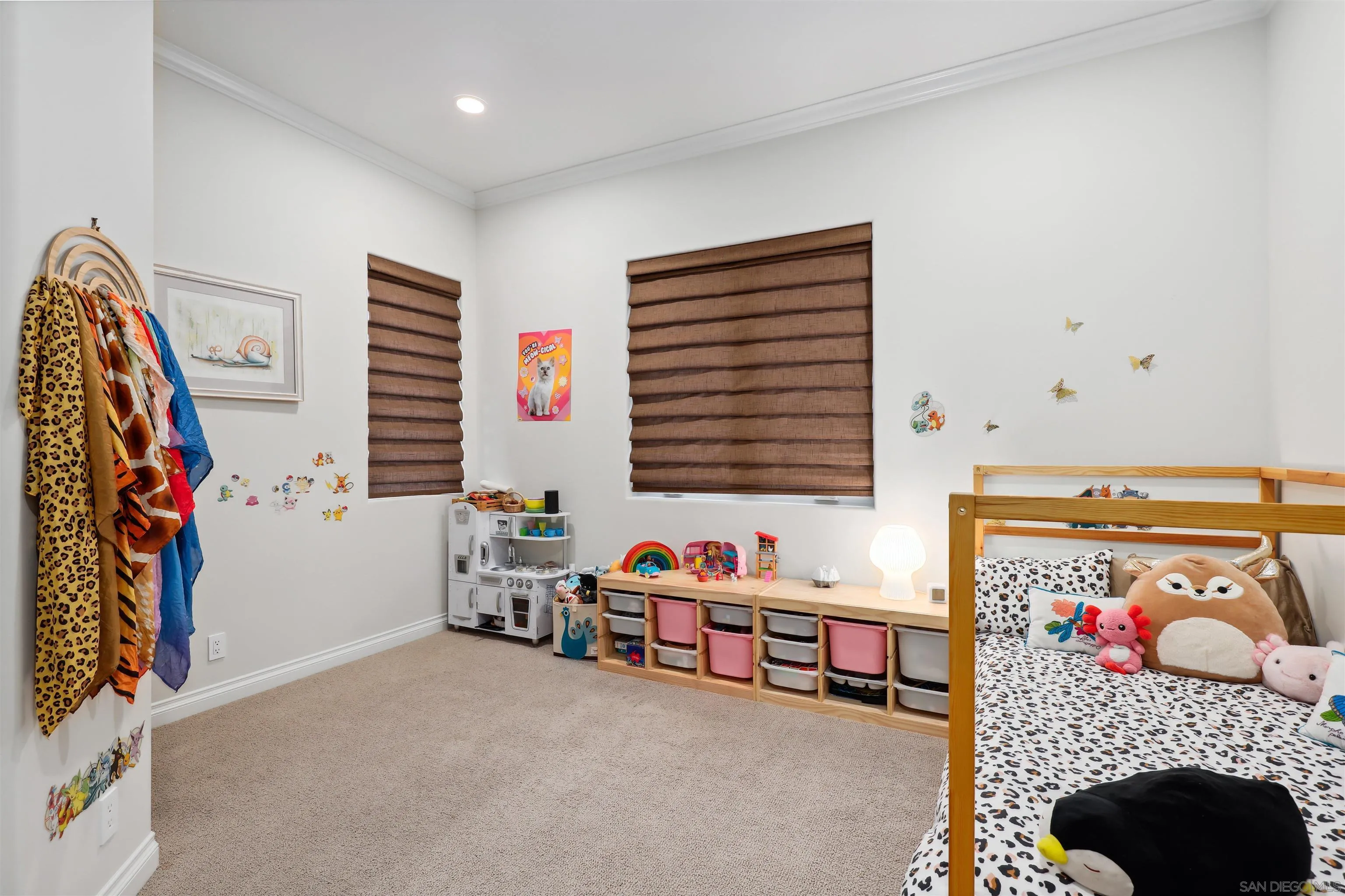 3055 Brookside Lane Encinitas, CA 92024 - Photo 33 of 64 a bedroom with furniture and a window