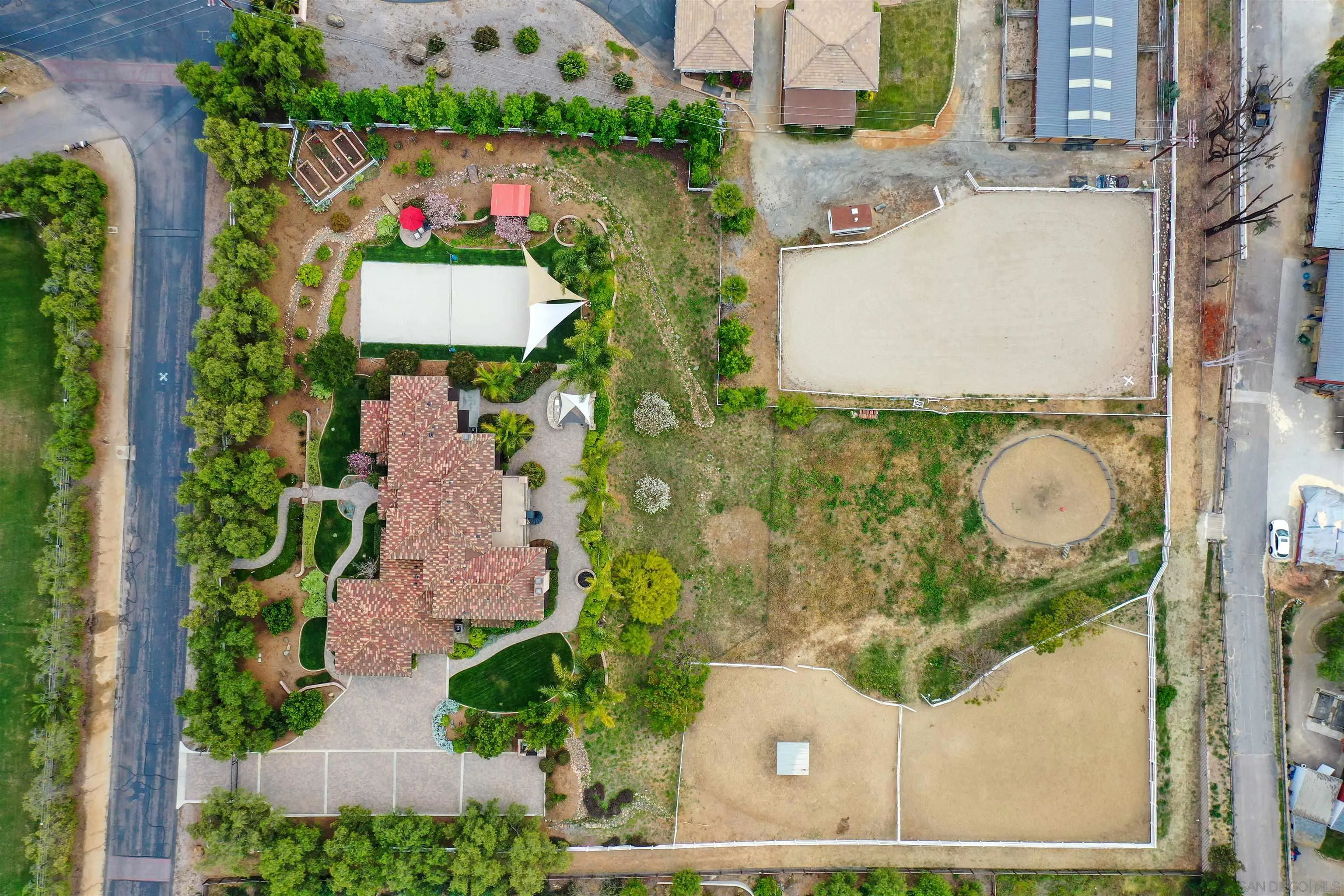 3055 Brookside Lane Encinitas, CA 92024 - Photo 64 of 64 an aerial view of residential house with outdoor space and parking
