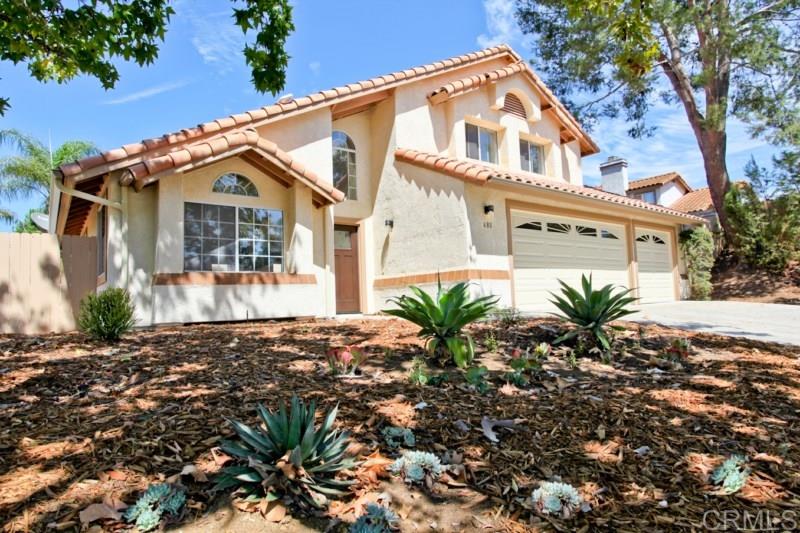 680 Brotherton Road Escondido, CA 92025 - Photo 1 of 15 Newly painted base perimeter stucco of the home.