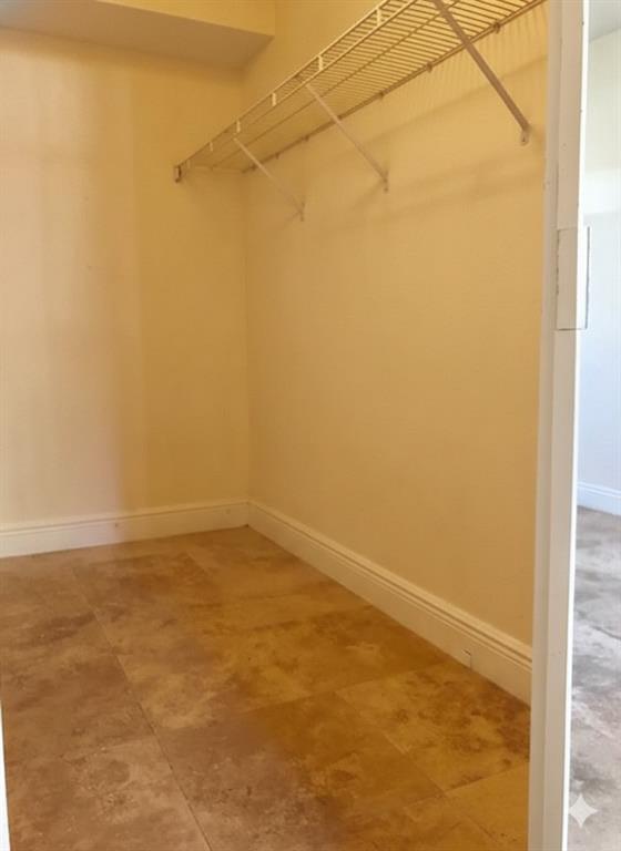 8721 Wiles Road, Unit 104 Coral Springs, FL 33067 - Photo 11 of 30 large walk-in/ master bedroom