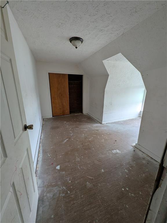 709-711 Fruit Way McKees Rocks, PA 15136 - Photo 13 of 37 a view of a big room with closet and windows