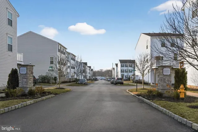 a view of a car park in front of house
