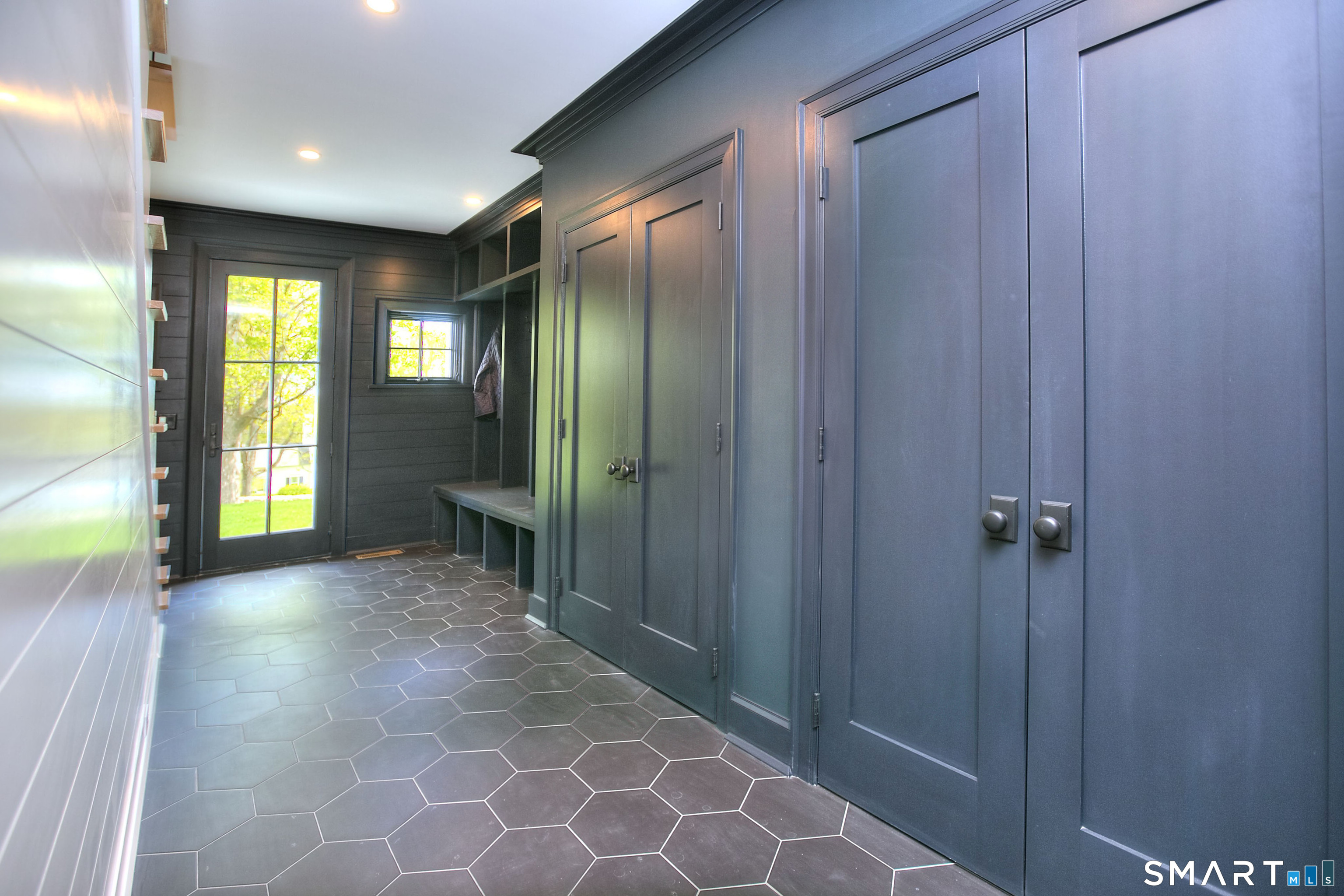 48 Kettle Creek Road Weston, CT 06883 - Photo 39 of 40 a view of a hallway with wooden floor and a bathroom