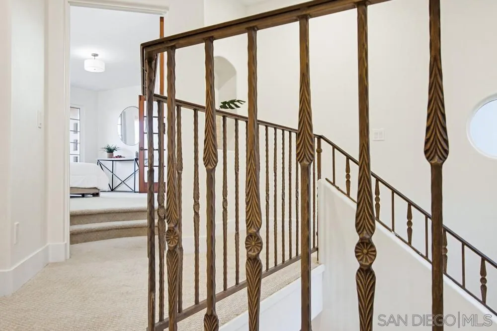 3993 Peony Drive Fallbrook, CA 92028 - Photo 41 of 52 a view of staircase with rug and windows