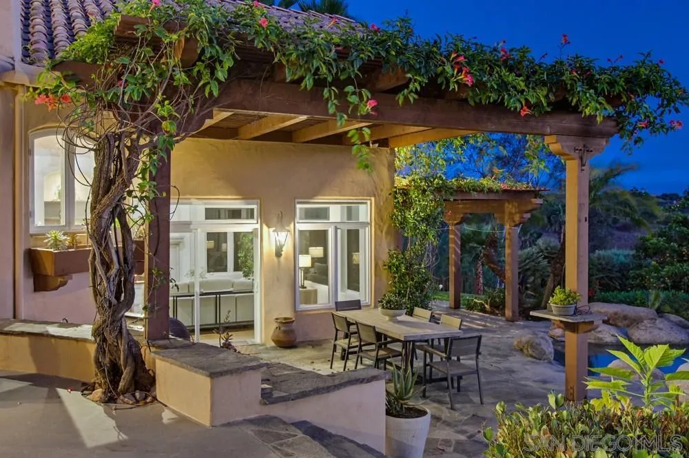 3993 Peony Drive Fallbrook, CA 92028 - Photo 49 of 52 a view of a patio with couches table and chairs and potted plants