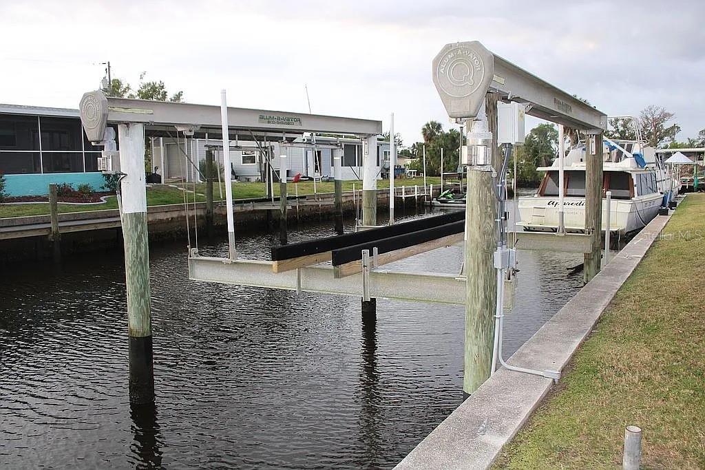 4252 Bardot Road Port Charlotte, FL 33953 - Photo 3 of 17 a balcony with view of swimming pool