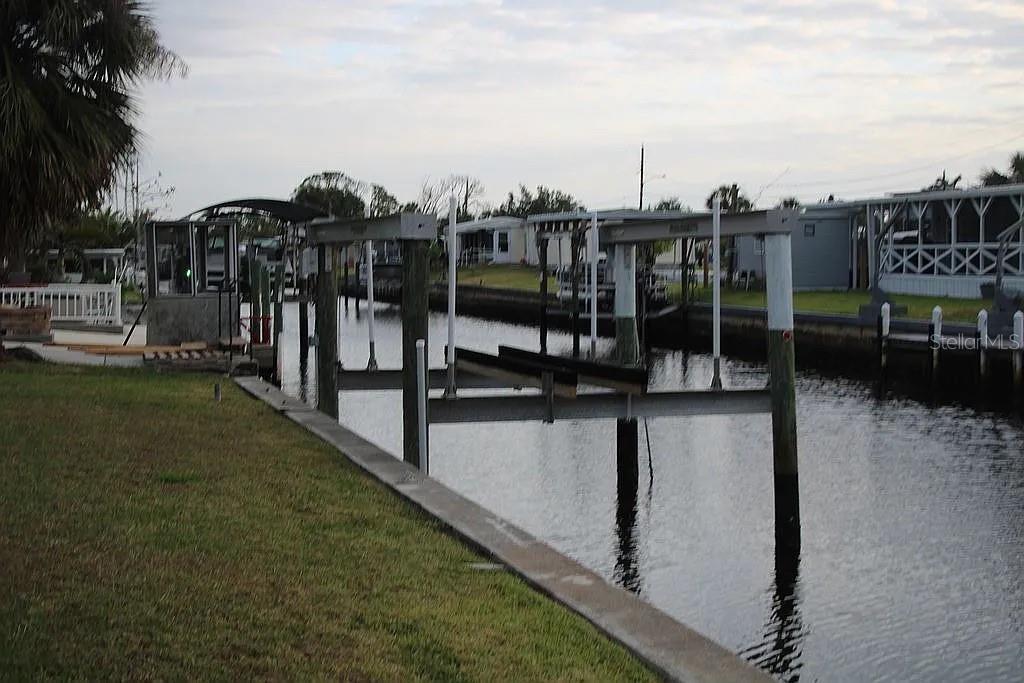 4252 Bardot Road Port Charlotte, FL 33953 - Photo 4 of 17 a view of a balcony with two chairs
