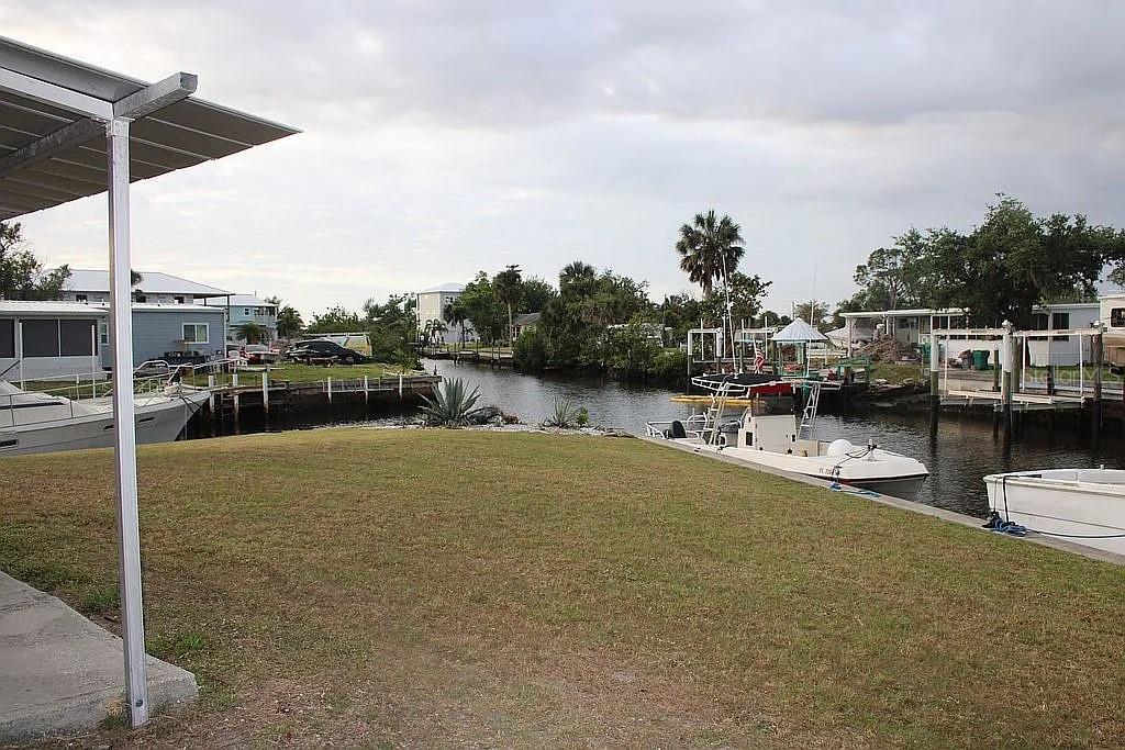 4252 Bardot Road Port Charlotte, FL 33953 - Photo 5 of 17 a terrace with outdoor seating and city view