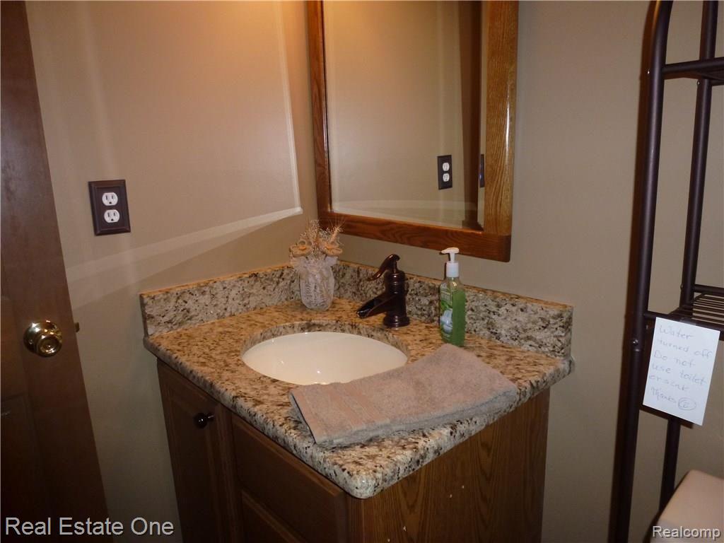 539 Shellbourne Drive Rochester, MI 48309 - Photo 8 of 37 Wood Floors in Powder Room