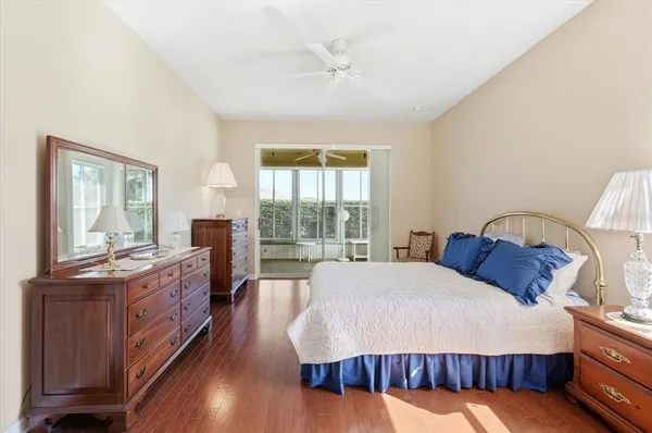 a bed room with a bed and a lamp