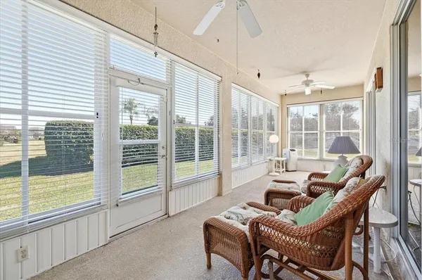 an aerial view of a house patio swimming pool and outdoor seating