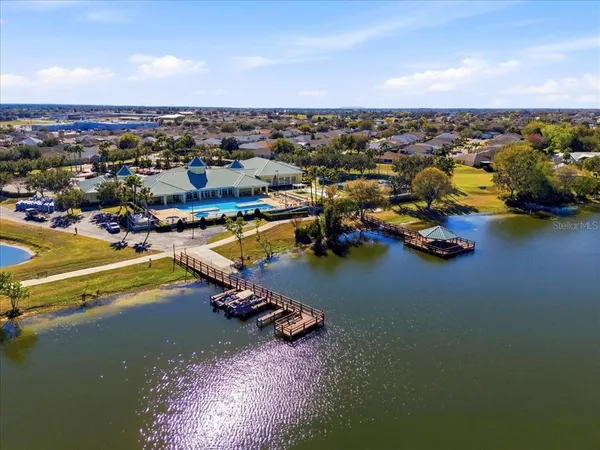 a view of a swimming pool with a porch