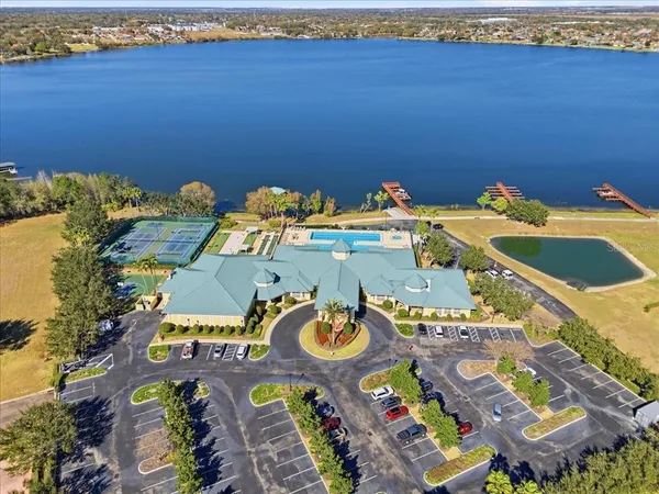a view of a swimming pool with lounge chair
