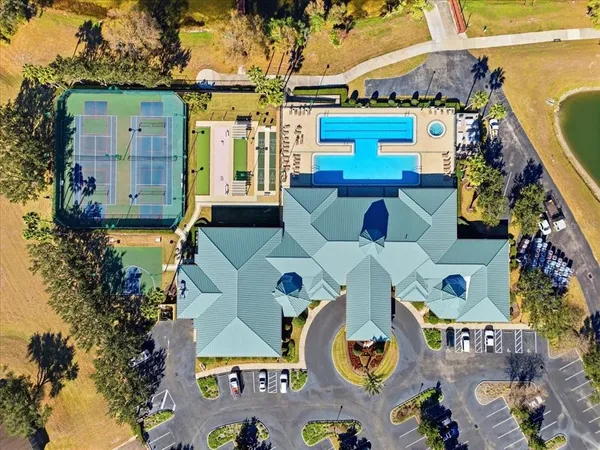 an aerial view of a building with a city view