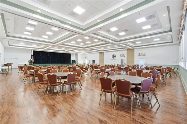an aerial view of residential house with outdoor space and parking