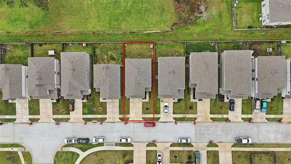 a picture of a bathroom with mirror and shower