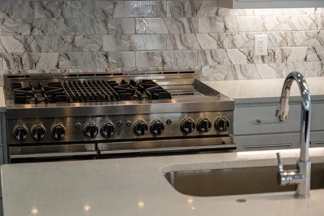 a bathroom with a shower and a sink