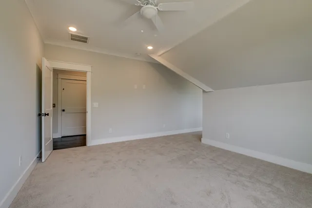 a view of a city with lush green forest