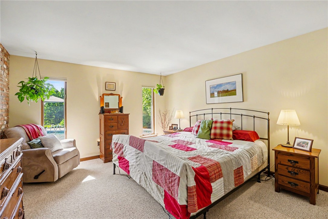 1722 Strong Road Victor, NY 14564 - Photo 13 of 33 3rd bedroom with a front view of the pool area and
