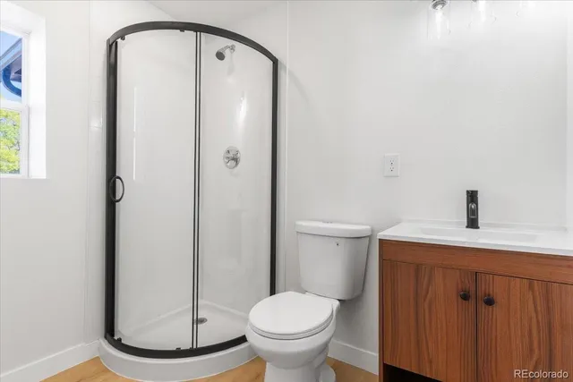 a bathroom with a toilet and a sink