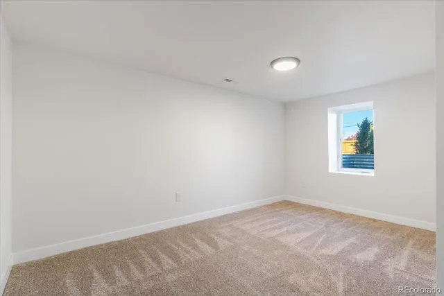 an empty room with a window