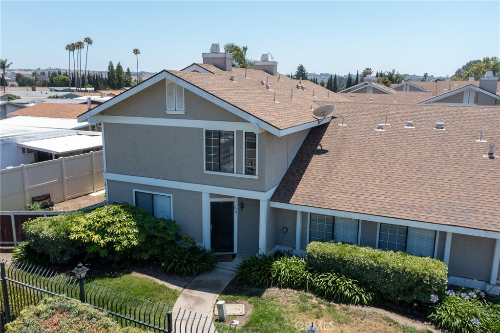 274 Riverview Way Oceanside, CA 92057 - Photo 2 of 6 a aerial view of a house with a yard and potted plants