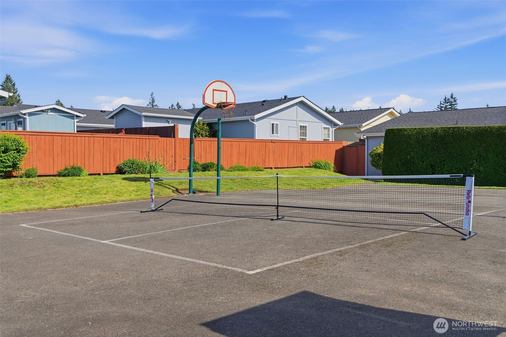 24036 222nd Avenue Southeast Maple Valley, WA 98038 - Photo 35 of 37 a view of a tennis court