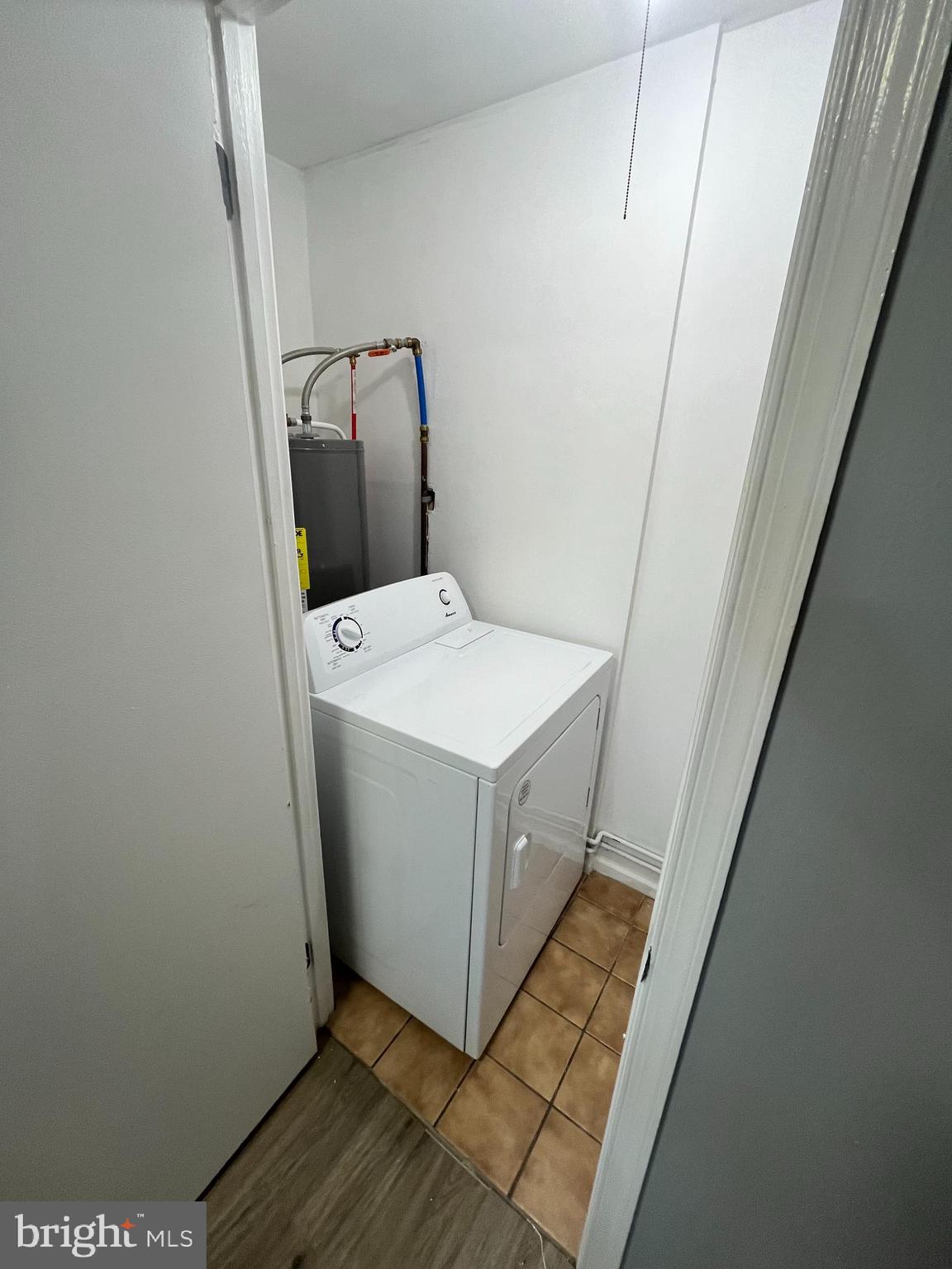 612 North Shady Retreat Road, Unit 14 Doylestown, PA 18901 - Photo 13 of 22 a utility room with dryer and washer