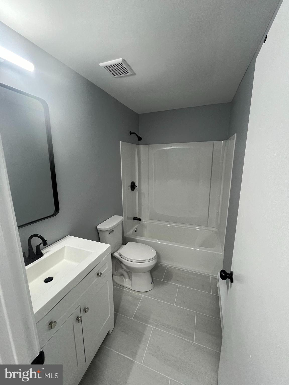 612 North Shady Retreat Road, Unit 14 Doylestown, PA 18901 - Photo 14 of 22 a bathroom with a toilet sink and shower