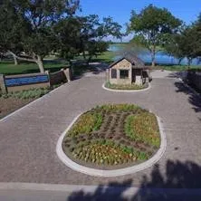 a view of a swimming pool with a yard