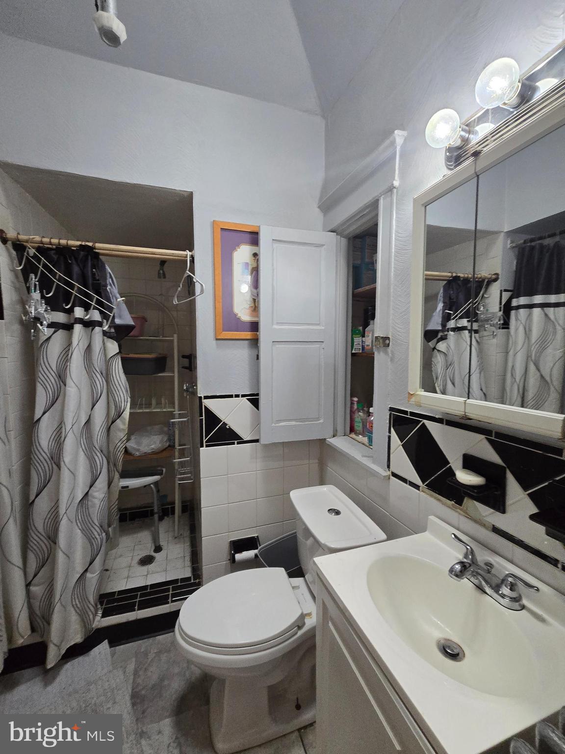 1959 Georgian Road Philadelphia, PA 19138 - Photo 22 of 29 a bathroom with a sink toilet and shower