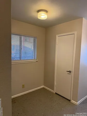 an empty room with a window