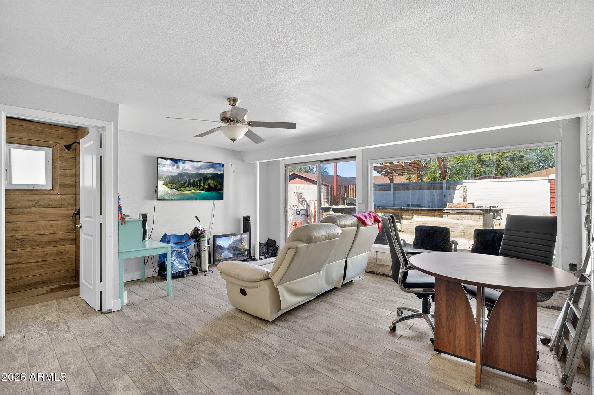 2222 West Flower Street Phoenix, AZ 85015 - Photo 12 of 36 a living room with furniture and a large window