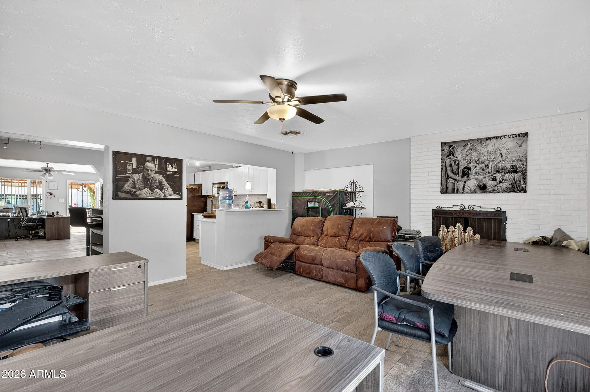2222 West Flower Street Phoenix, AZ 85015 - Photo 13 of 36 a living room with furniture and wooden floor