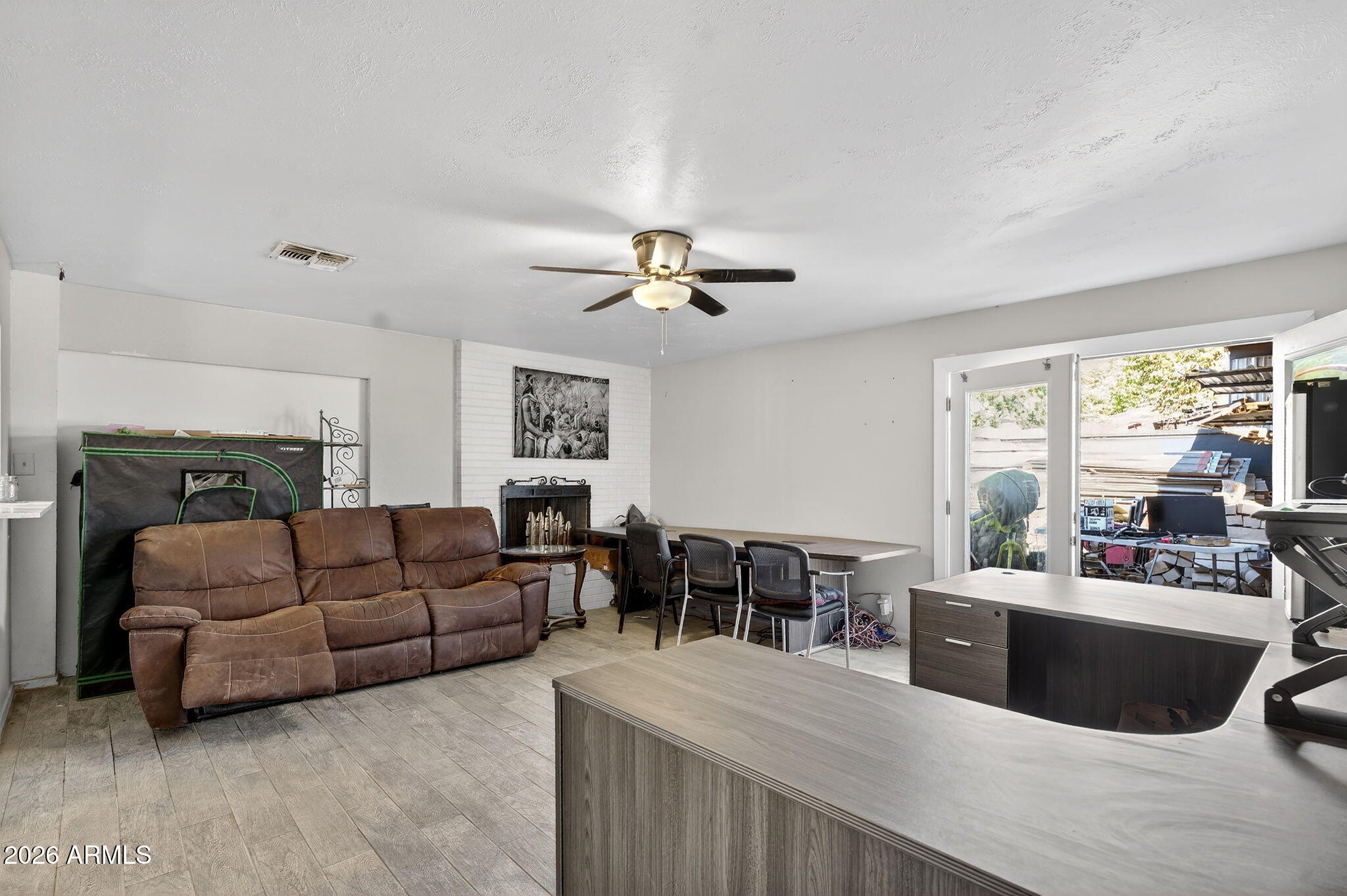 2222 West Flower Street Phoenix, AZ 85015 - Photo 14 of 36 a living room with furniture kitchen view and a large window