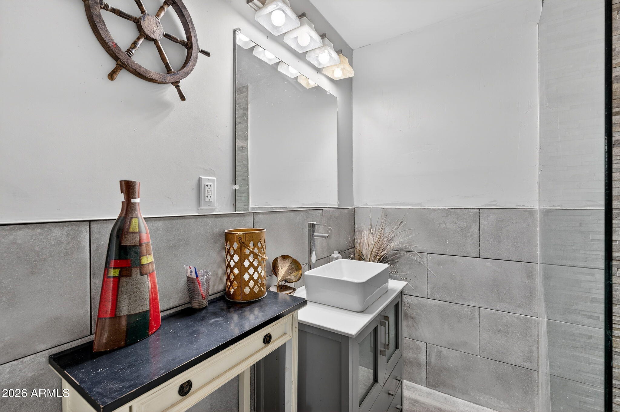 2222 West Flower Street Phoenix, AZ 85015 - Photo 22 of 36 a bathroom with a sink and a mirror