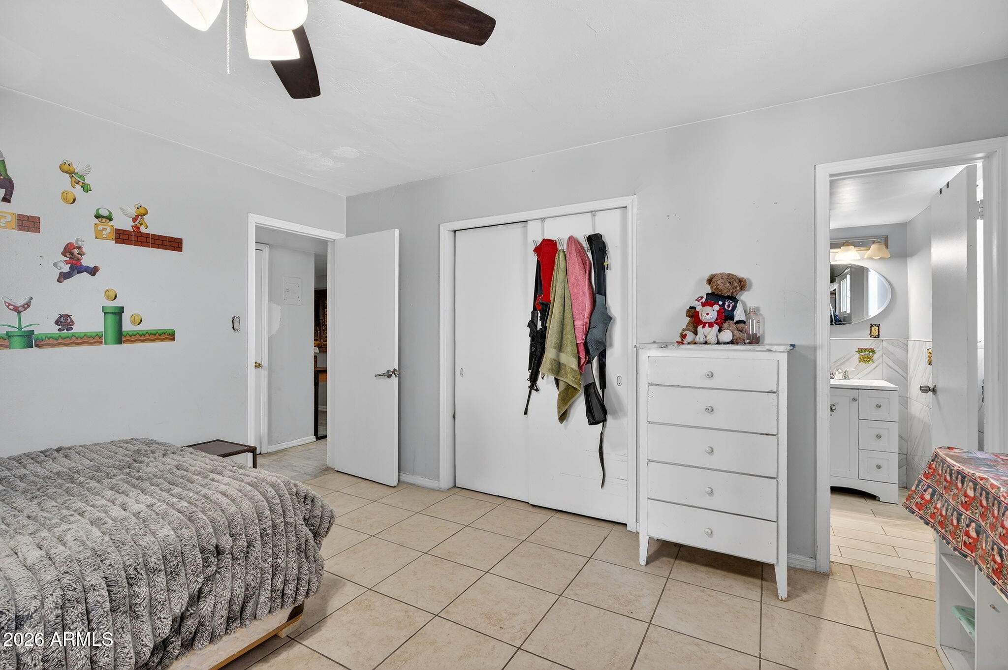 2222 West Flower Street Phoenix, AZ 85015 - Photo 29 of 36 a bedroom with a bed and a cabinets