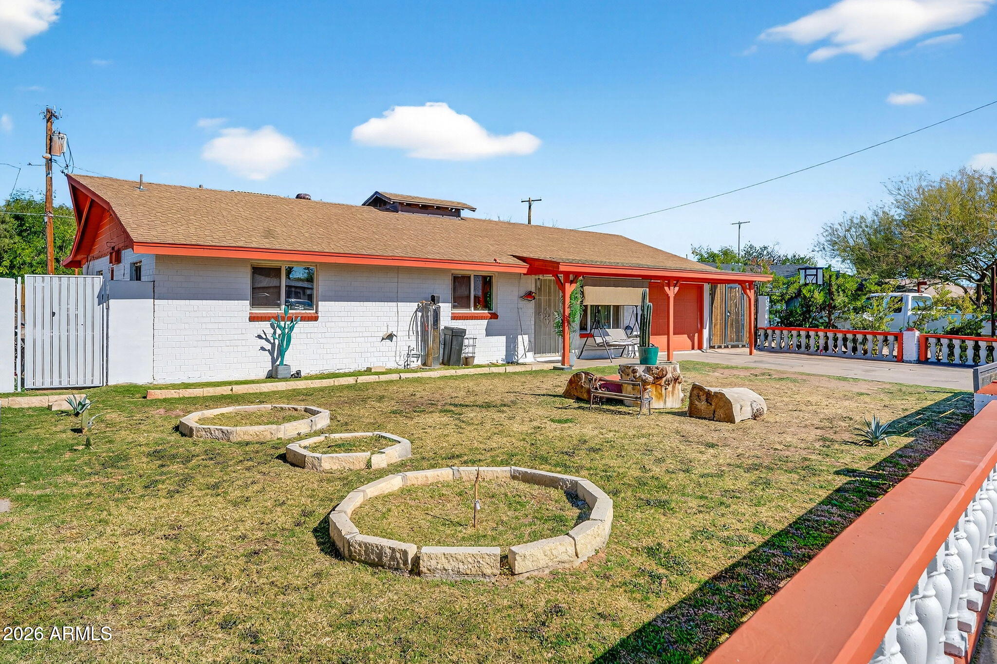 2222 West Flower Street Phoenix, AZ 85015 - Photo 2 of 36 a view of a backyard with swimming pool
