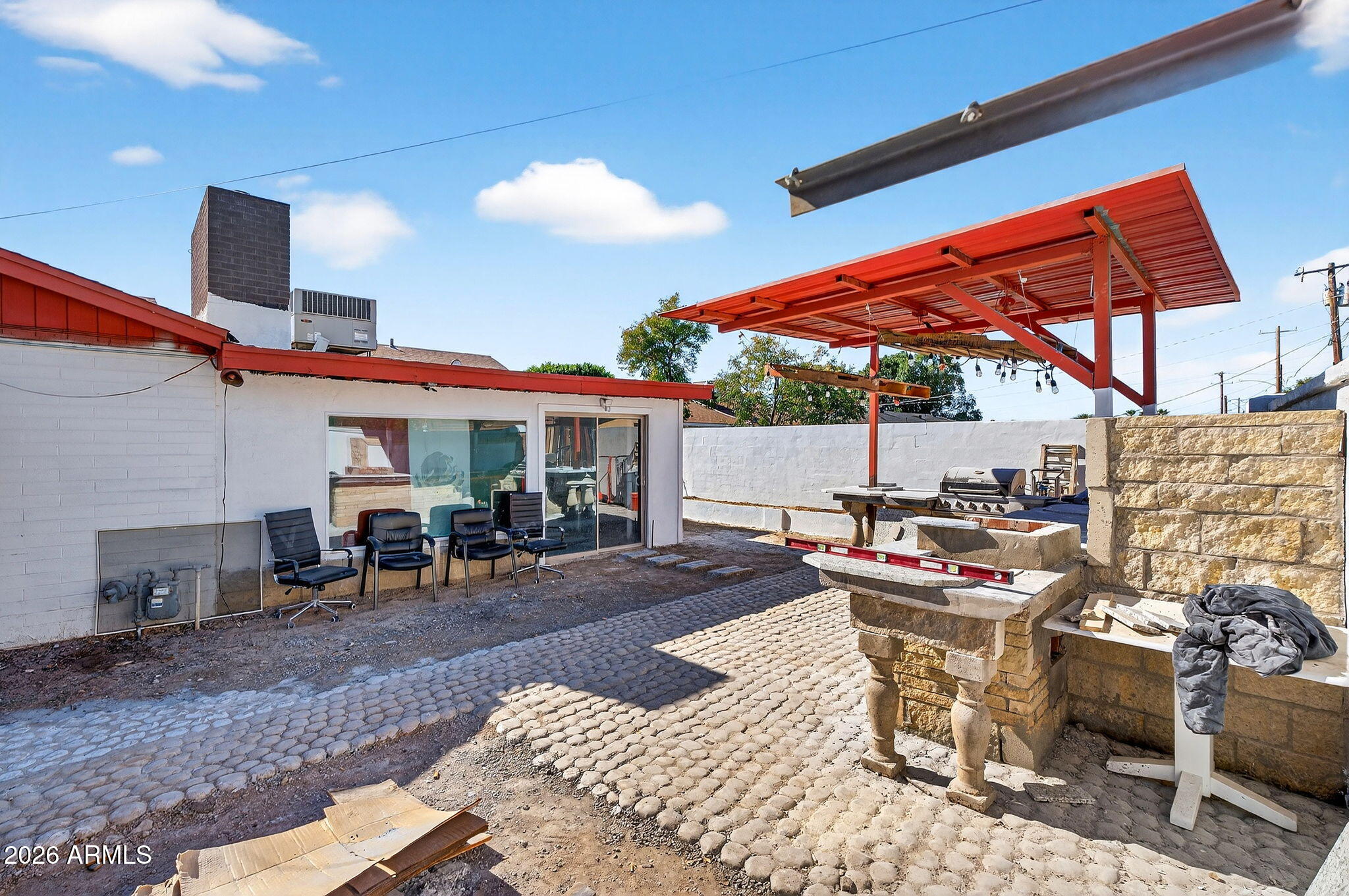 2222 West Flower Street Phoenix, AZ 85015 - Photo 33 of 36 a view of a chairs and table in a patio